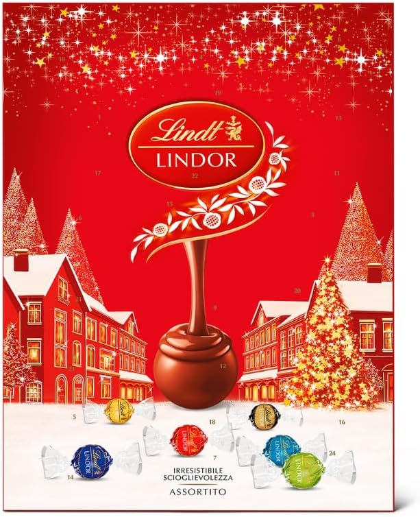 Calendario dell'Avvento Lindt Lindor rosso con paesaggio innevato e praline assortite